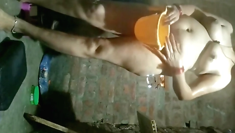 Indian teen auntie gets naked and enjoys her own bathroom bath