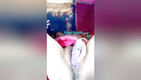Indian girl with a hairy pussy rides a toy in her cunt