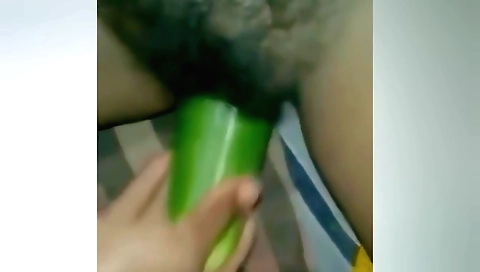 Amateur female gives a good time with a big dildo in pussy
