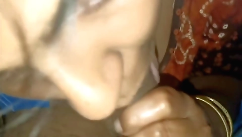 Indian wife fucks her husband in mouth on the couch