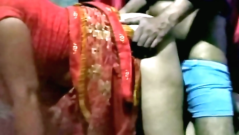 Amateur indian video of a guy giving a handjob to a girl in his bed