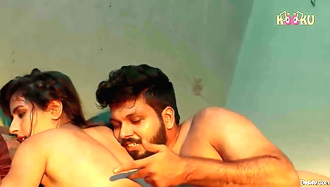 Sexy brunette in a sexy blouse and cute pink heels