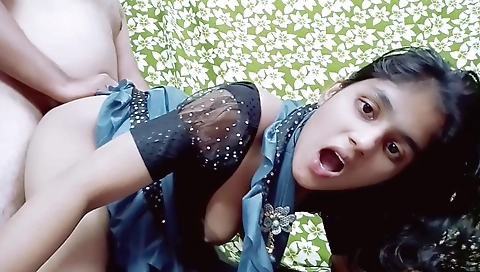 Indian girl with small tits is taking off her pants on the bed