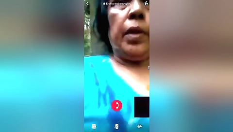 Mature chick in white dress shows her pussy on web cam