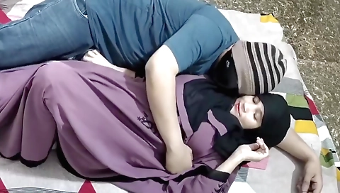 Indian girl in red dress and black shirt invites a guy