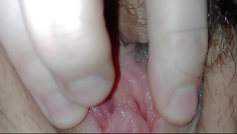 Sexy female with a sexy face loves touching her wet pussy