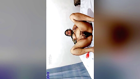 Brunette masturbates in bed on webcam with hairy pussy