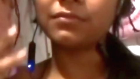 Indian brunette plays with her tiny pussy in webcams