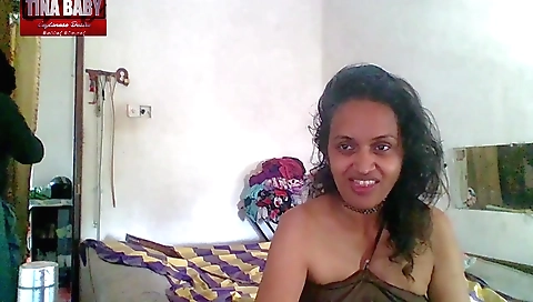 Indian girl with small boobs getting hot on a camera