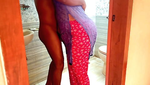 Indian mature with a big ass and a small dick in the bathroom