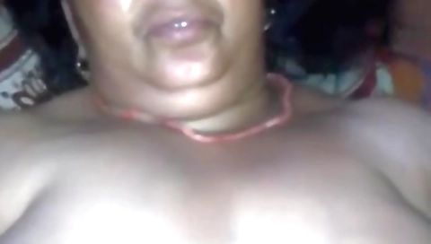 A mature indian with big boobs is getting penetrated