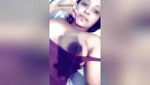 Indian babe with big boobs rides her lover on the couch