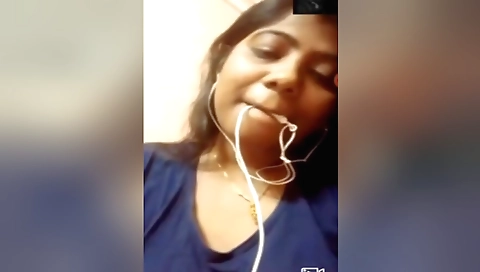 Indian brunette in sexy dress shows her nice tits and pussy