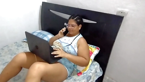 Busty brunette with a big boobed ass is masturbating