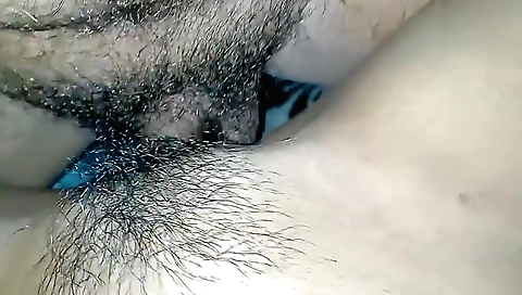 Indian hairy girl with a sexy face shows us her hairy body