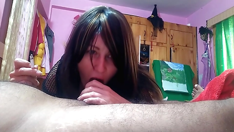 Amateur brunette sex in a webcam scene with a cock