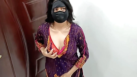 Sexy brunette milf in living room playing with hair