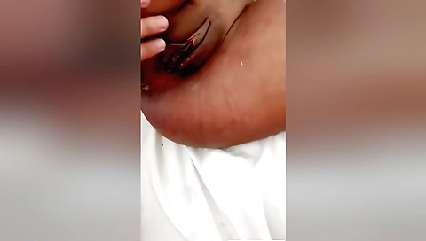 Beautiful teen girl with a cute body is making homemade videos